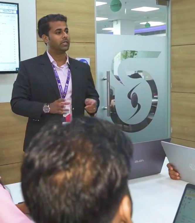 Employees collaborating in office workspace